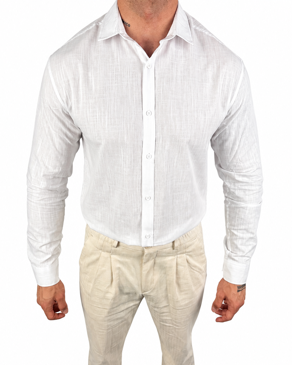 A man wearing a white long-sleeve linen button-up shirt and beige linen trousers, shown from the neck down against a plain white background.