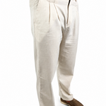 A person wearing off-white pleated trousers and brown slip-on shoes, shown from the waist down against a plain white background.